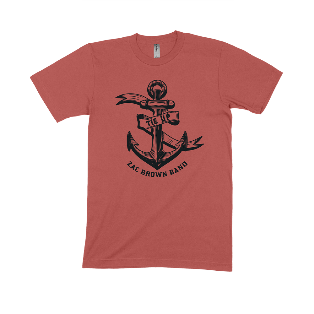 Coral-colored t-shirt featuring a black anchor design and ’Zac Brown Band’ text.